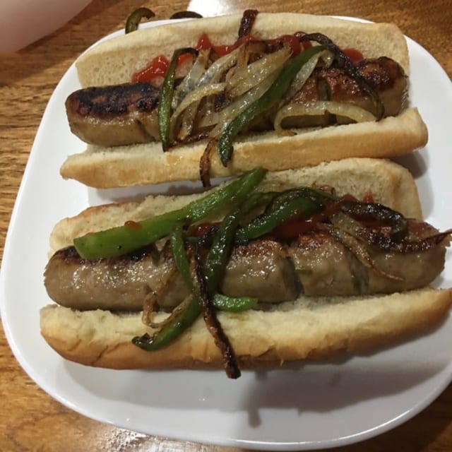 Italian Sausage on Roll with Peppers & Onions.