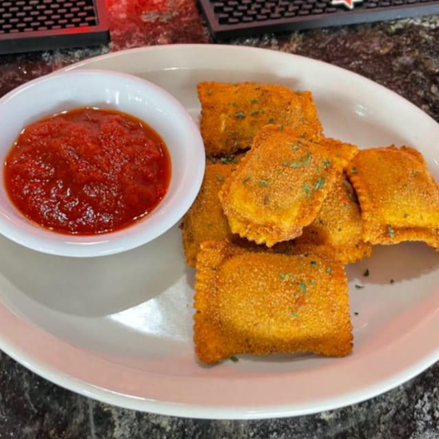 Homemade Toasted Meat Ravioli with Marinara Sauce.