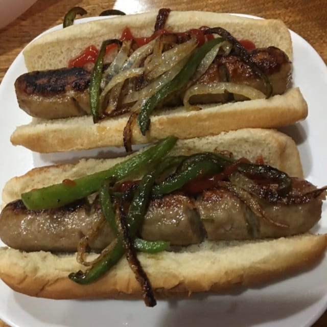 Italian Sausage on Roll with Peppers & Onions.