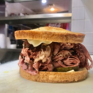 Sy Ginsberg Brand Corned Beef or Pastrami Sandwich on Rye, Onion Roll or Kaiser Roll